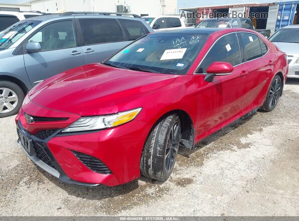4T1K61AK4LU397864 2020 TOYOTA CAMRY Red Vista tres cuartos delantera izquierda