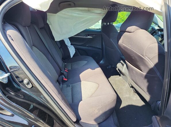 4T1R11AK7RU228525 2024 TOYOTA CAMRY Black Rear seats view