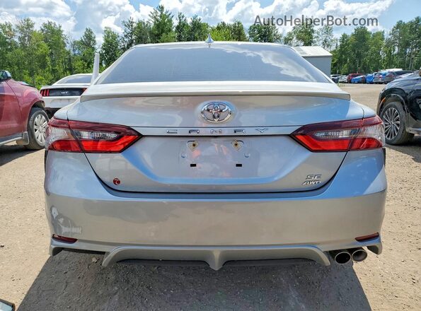 4T1S11BK8MU034689 2021 TOYOTA CAMRY Silver Vista trasera
