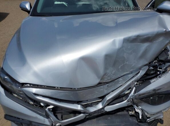 4T1S11BK8MU034689 2021 TOYOTA CAMRY Silver Vista interior trasera