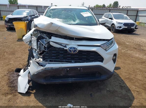 4T3B6RFV1MU054441 2021 TOYOTA RAV4 HYBRID White Front view