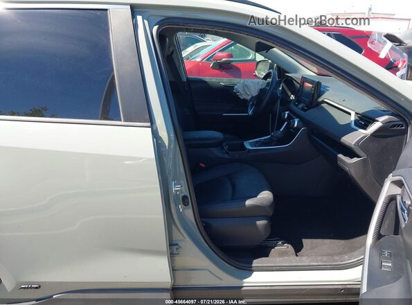 4T3B6RFV3NU080086 2022 TOYOTA RAV4 HYBRID Gray Vista interior delantera
