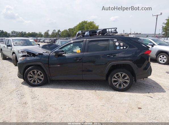 4T3B6RFV3PU118936 2023 TOYOTA RAV4 HYBRID Black Vista interior trasera