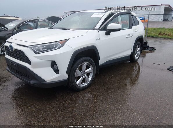 4T3B6RFVXMU007618 2021 TOYOTA RAV4 HYBRID White Front left
