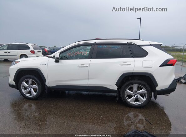 4T3B6RFVXMU007618 2021 TOYOTA RAV4 HYBRID White Rear interior view
