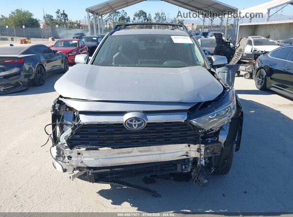 4T3B6RFVXMU041204 2021 TOYOTA RAV4 HYBRID Silver Вид задньої частини салону