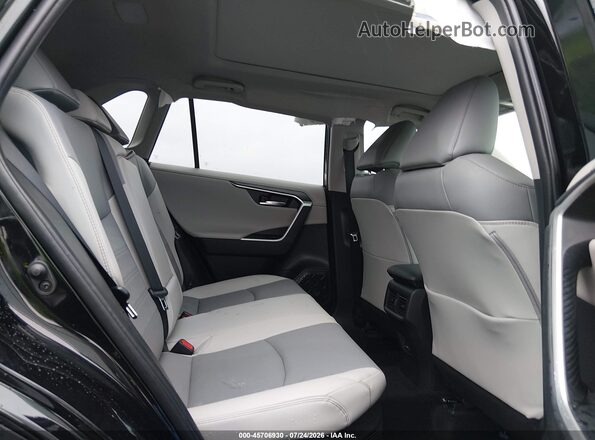 4T3D6RFV0RU165126 2024 TOYOTA RAV4 HYBRID Black Vista de la etiqueta del VIN