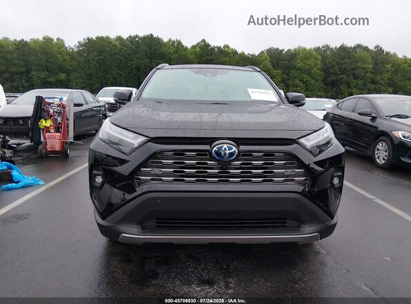 4T3D6RFV0RU165126 2024 TOYOTA RAV4 HYBRID Black Vista interior trasera