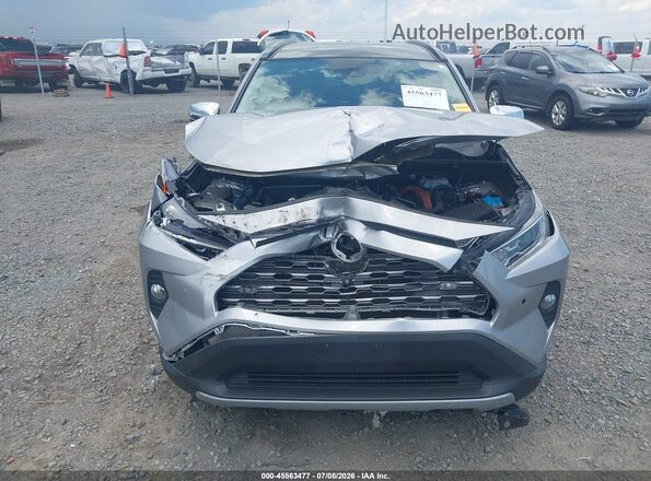 4T3D6RFV5MU049879 2021 TOYOTA RAV4 HYBRID Silver Front view