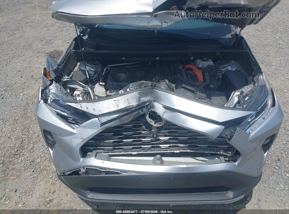 4T3D6RFV5MU049879 2021 TOYOTA RAV4 HYBRID Silver Rear view