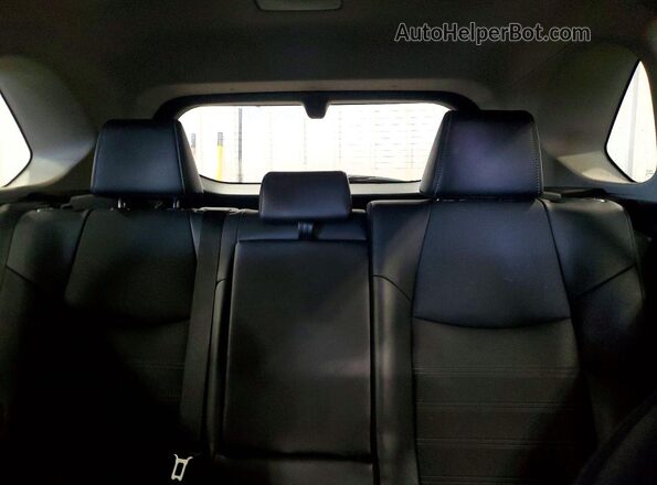 4T3D6RFV6PU129874 2023 TOYOTA RAV4 Red Vista de los asientos traseros