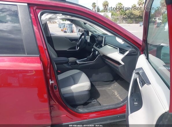 4T3D6RFV9MU016805 2021 TOYOTA RAV4 HYBRID Red Widok wnętrza z przodu