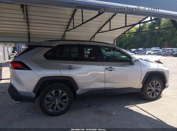 4T3D6RFV9PU114821 2023 TOYOTA RAV4 HYBRID Silver Սալոնի հետևի տեսք