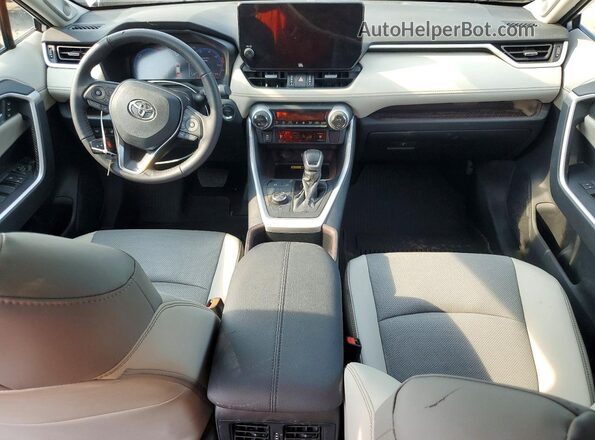 4T3D6RFV9PU134969 2023 TOYOTA RAV4 Серебряный Вид панели приборов