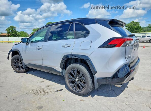 4T3E6RFV0PU107776 2023 TOYOTA RAV4 Silver Trasero izquierdo