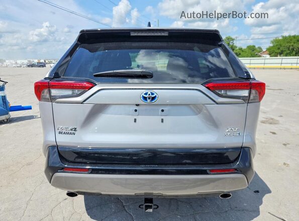 4T3E6RFV0PU107776 2023 TOYOTA RAV4 Silver Vista trasera