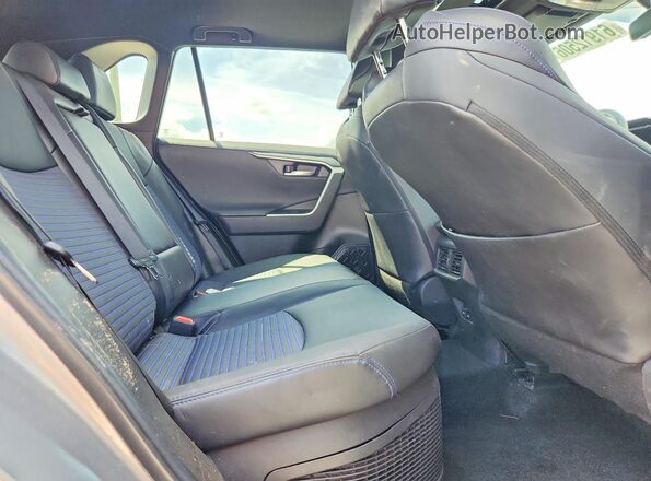 4T3E6RFV0PU107776 2023 TOYOTA RAV4 Silver Vista interior trasera