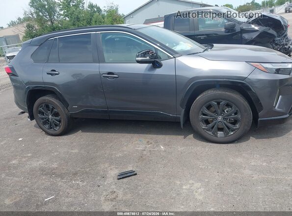 4T3E6RFV2RU144556 2024 TOYOTA RAV4 HYBRID Gray Rear interior view