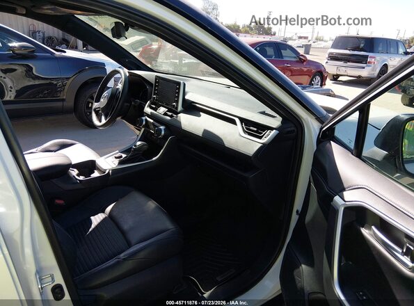 4T3E6RFV3MU045463 2021 TOYOTA RAV4 HYBRID White Front interior view