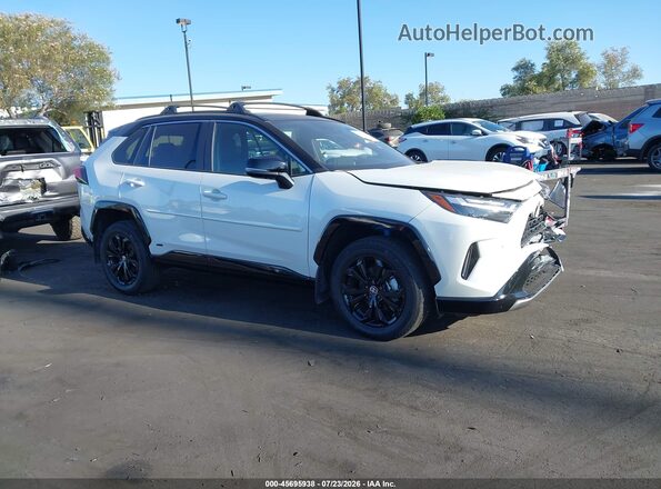 4T3E6RFV3NU078609 2022 TOYOTA RAV4 HYBRID White Widok wnętrza z tyłu