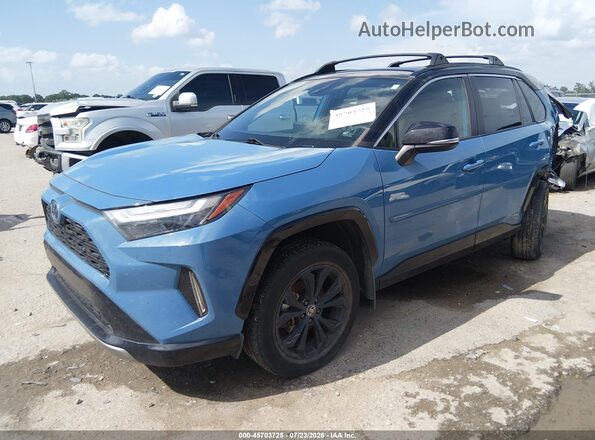 4T3E6RFV4PU106274 2023 TOYOTA RAV4 HYBRID Blue Vista tres cuartos delantera izquierda