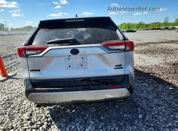 4T3E6RFV7RU163605 2024 TOYOTA RAV4 Silver Հետևի տեսք