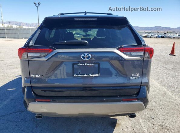 4T3E6RFVXRU167633 2024 TOYOTA RAV4 Угольный Вид сзади