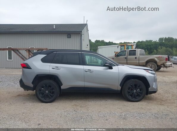 4T3E6RFVXSU185698 2025 TOYOTA RAV4 HYBRID Серебряный Вид задней части салона
