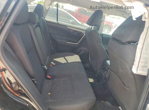 4T3LWRFVXRU144571 2024 TOYOTA RAV4 Black Rear interior view