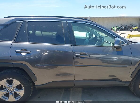 4T3MWRFV4RU147700 2024 TOYOTA RAV4 HYBRID Gray Вид задньої частини салону