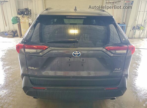4T3RWRFV0RU118569 2024 TOYOTA RAV4 Gray Rear view