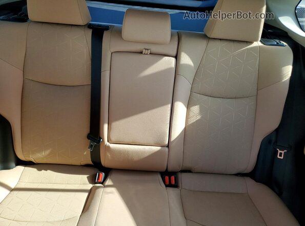 4T3RWRFV0SU209072 2025 TOYOTA RAV4 White Rear seats view