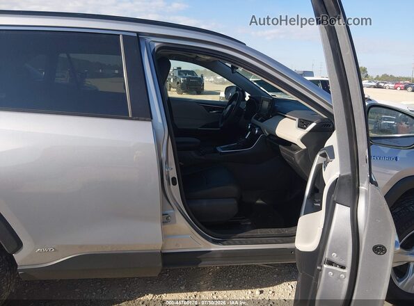 4T3RWRFV1MU023320 2021 TOYOTA RAV4 HYBRID Gray Front interior view
