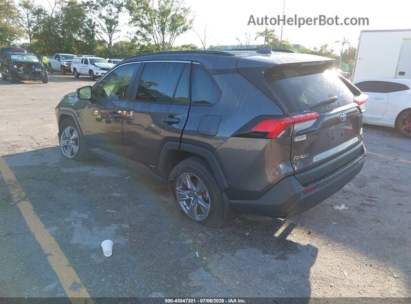 4T3RWRFV2RU142713 2024 TOYOTA RAV4 HYBRID Gray Trasero izquierdo