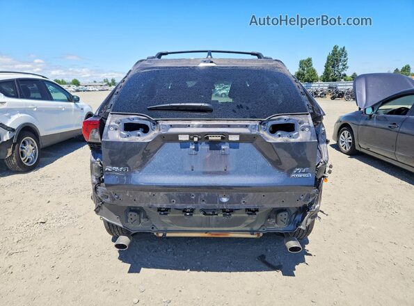 4T3RWRFV2RU143425 2024 TOYOTA RAV4 Gray Rear view
