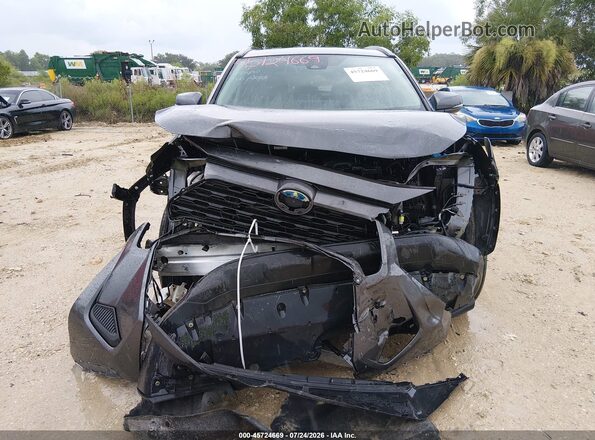4T3RWRFV5NU057259 2022 TOYOTA RAV4 HYBRID Gray Vista interior trasera