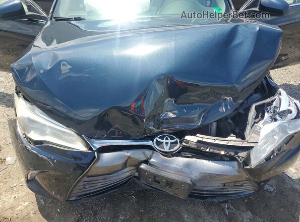 4T4BF1FK0GR555377 2016 TOYOTA CAMRY Black Vista interior trasera