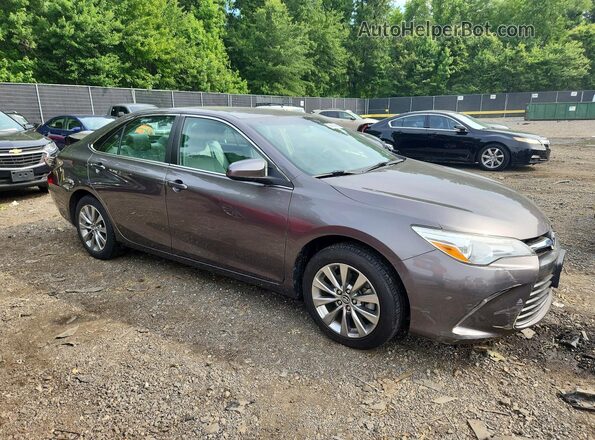 4T4BF1FK1GR580451 2016 TOYOTA CAMRY Gray Front right