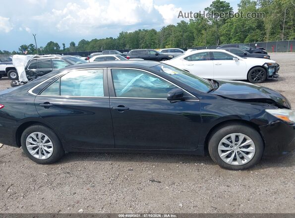 4T4BF1FK4GR557682 2016 TOYOTA CAMRY Black Widok wnętrza z tyłu