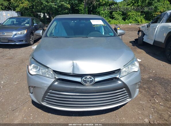 4T4BF1FK4GR580105 2016 TOYOTA CAMRY Silver ხელსაწყოთა პანელის ხედი