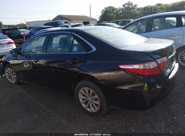 4T4BF1FK7GR531285 2016 TOYOTA CAMRY Black უკანა სალონის ხედი