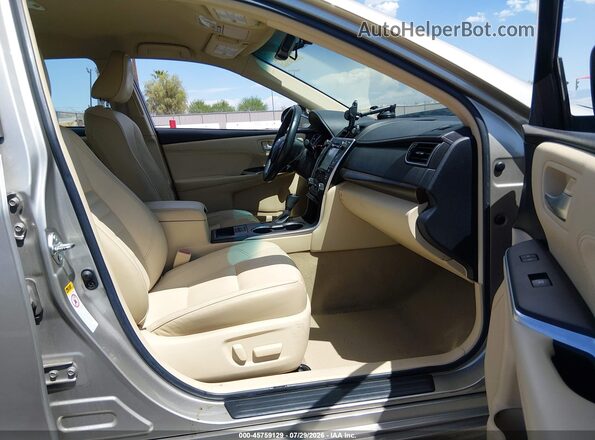 4T4BF1FK7GR562231 2016 TOYOTA CAMRY Золотой Вид салона спереди