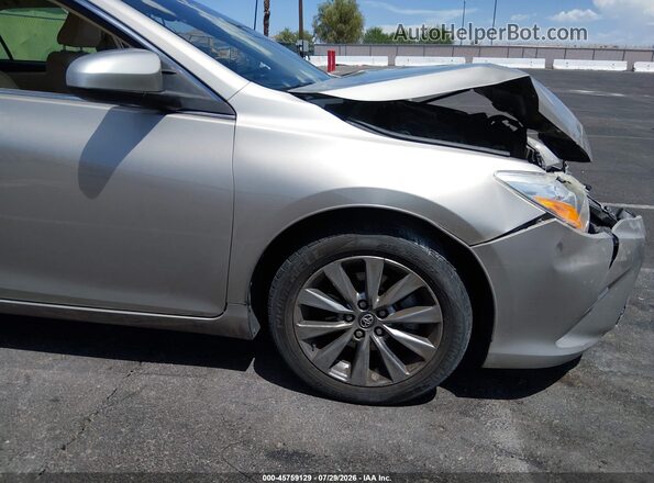 4T4BF1FK7GR562231 2016 TOYOTA CAMRY Золотой Вид спереди