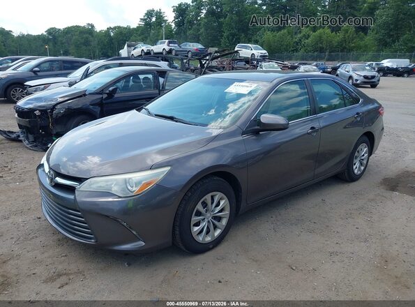 4T4BF1FK8GR535085 2016 TOYOTA CAMRY Gray Vista tres cuartos delantera izquierda