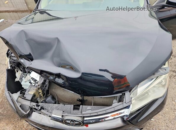 4T4BF1FK9GR520658 2016 TOYOTA CAMRY Black Vista interior trasera