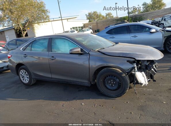4T4BF1FKXGR555970 2016 TOYOTA CAMRY Gray Սալոնի հետևի տեսք