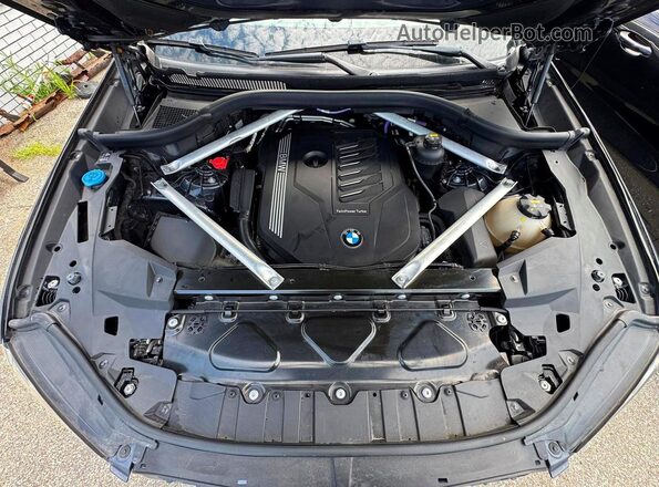 5UXCY4C02M9D86075 2021 BMW X6 Угольный Вид салона спереди