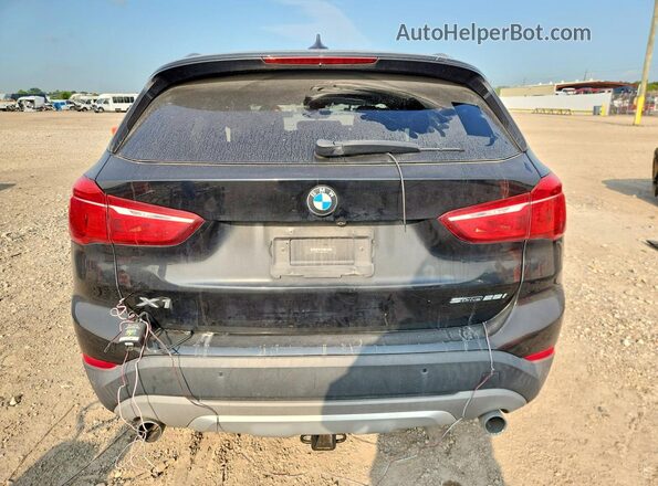 WBXHU7C58K3H45075 2019 BMW X1 Black Widok wnętrza z przodu