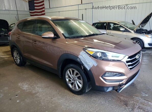 KM8J33A22GU095320 2016 HYUNDAI TUCSON Brown Դիմացի տեսք