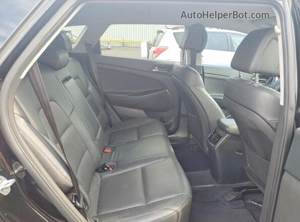 KM8J33A29GU080748 2016 HYUNDAI TUCSON Black Vista interior trasera